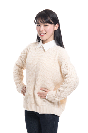 Studio portrait of twenties Asian women smiling confident and happyの写真素材