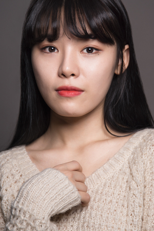 Studio Female of 20 Sad Asian Womenの写真素材