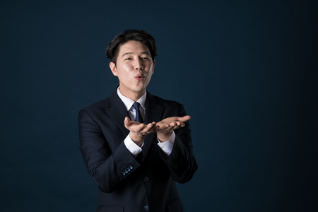 Portrait of a happy Asian business manの写真素材