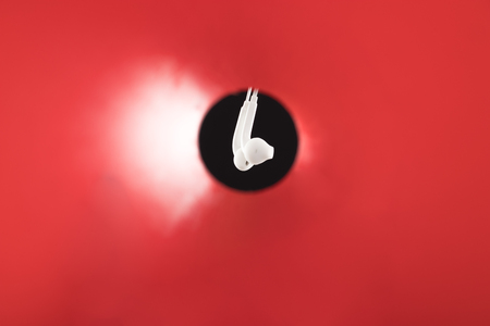 The red megaphone in earphonesの写真素材
