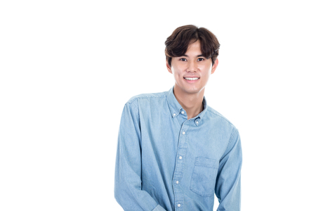 Studio portrait of a happy and handsome asian manの写真素材