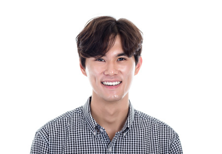 Studio portrait of a happy and handsome asian manの写真素材