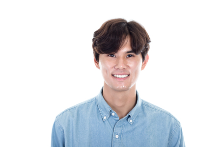 Studio portrait of a happy and handsome asian manの写真素材