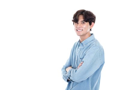 Studio portrait of a happy and handsome asian manの写真素材