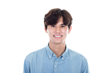 Studio portrait of a happy and handsome asian manの写真素材