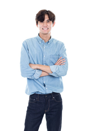 Studio portrait of a happy and handsome asian manの写真素材