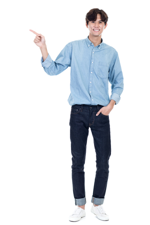 Studio full body portrait of a young asian manの写真素材