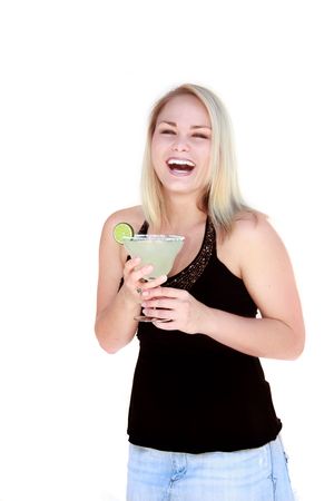 Pretty young blond woman in party situation holding a margarita.の写真素材