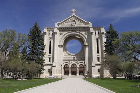 Saint Boniface Cathedral in summer with blue sky, Winnipeg, Manitoba, Canada.の写真素材