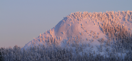 Konttainen fell lit by sunset. Konttainen fell is along the famous Karhunkierros hiking trail in Kuusamo, in Finland.の写真素材