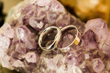 Background with two rings over cristal stonesの写真素材