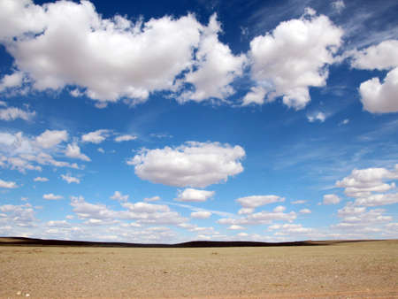 Ground and sky with clouds landscapeの写真素材