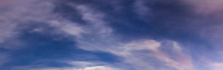 Starry sky and clouds panoramaの写真素材