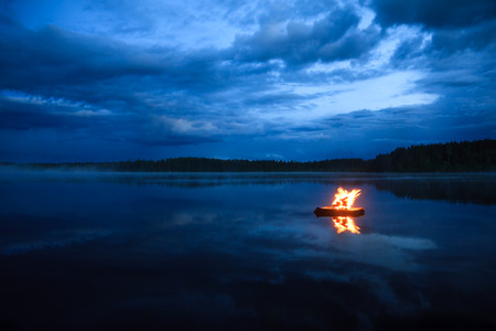 Campfire on the lakeの写真素材