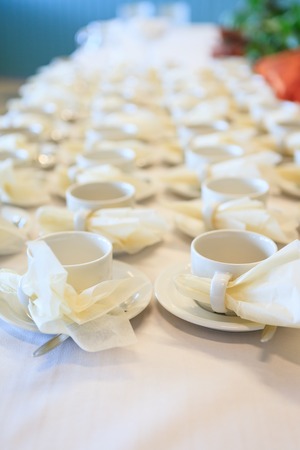 Many white coffee cups waiting for servingの写真素材