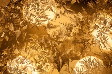 Rime on window and christmas light bokeh on backgroundの写真素材