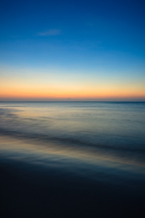 Minimalistic seascape at twilight long exposureの写真素材