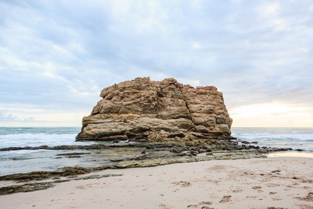 Big rock beach sunset long exposureの写真素材