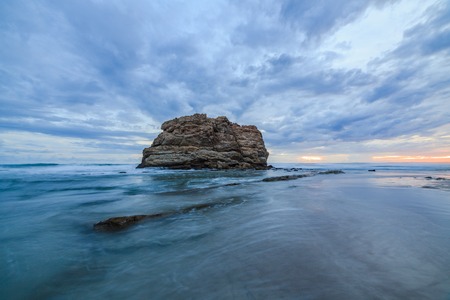 Big rock beach sunset long exposureの写真素材