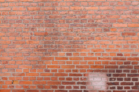 Old worn urban brick wall texture backgroundの写真素材