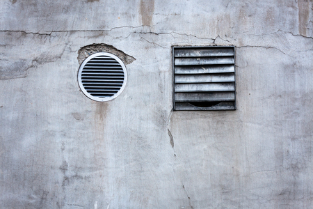 Concrete wall and air vents exteriorの写真素材