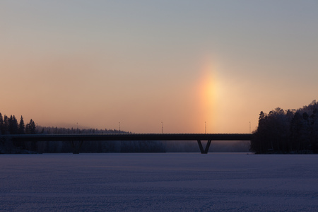 Sundogs at winter on frozen lakeの写真素材