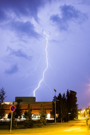 Lightning in city at nightの写真素材