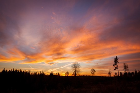 Beautiful vibrant sunset clouds view landscape in finlandの写真素材