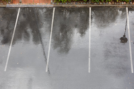 Empty parking lot in rain