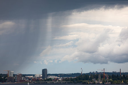 Summer day raining sky viewed from far
