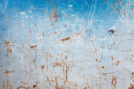 Scratched rusty metal wall texture background