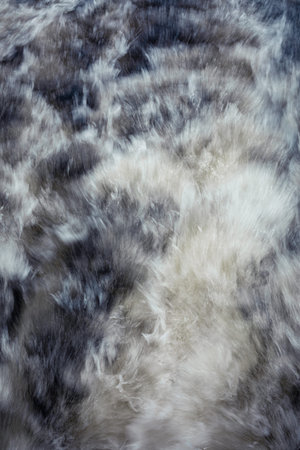 Fast moving water boat trail long exposure abstract view