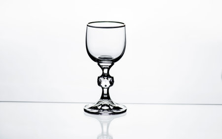 Glass of vodka on a white background