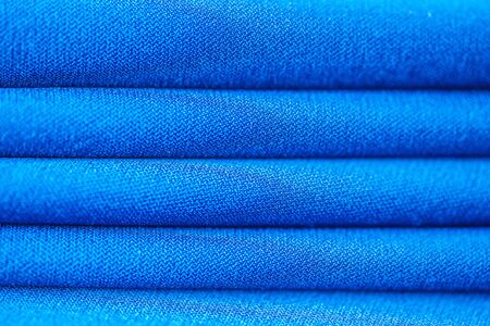 High resolution background texture, decorative basis for design, silk blue fabric to make the desired size or shape by inserting the necessary elements or details.の写真素材