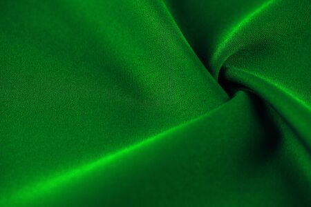 High resolution background texture, decorative basis for design, silk green fabric to make the desired size or shape by inserting the necessary elements or details.の写真素材