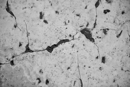 Old cracked cement. Texture, background, pattern. Concrete template for design and decoration.