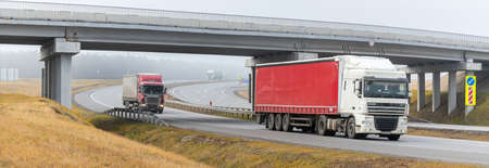 Tatarstan, Russia, Interstate Highway M7 - Nov 04th 2020. Foggy morning. Track with car traffic. Interchange on the M7 highwayのeditorial素材