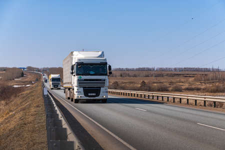 Tatarstan, Russia, Interstate Highway M7 - Apr 14th 2021. DAF Trucks move along the federal highway to their destination.のeditorial素材
