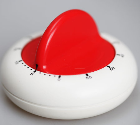 Classic plastic kitchen timer  on gray background