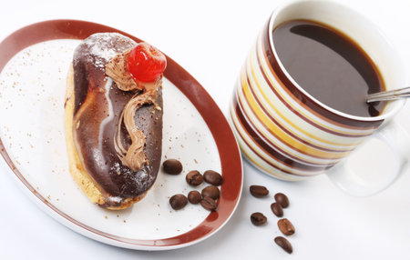 a piece of chocolate cake with coffee