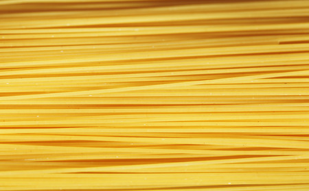 Food theme: raw pasta as whole backgroundの写真素材