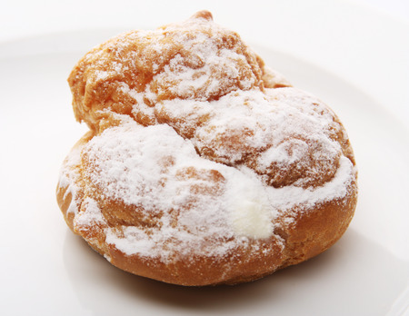 russian cream roll on white plateの写真素材