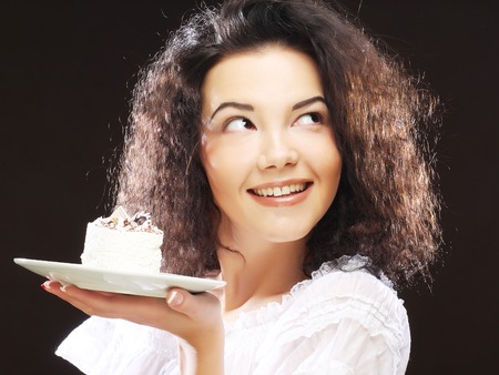 young woman with a cakeの写真素材