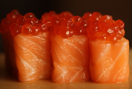rolls with salmon and red caviar, japanese foodの写真素材