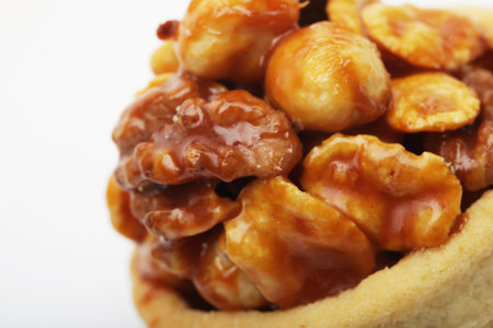 delicious cookies with nuts and caramel  on  white backgroundの写真素材