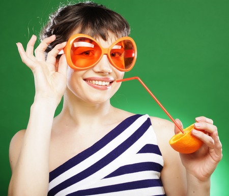 woman with orangesの写真素材