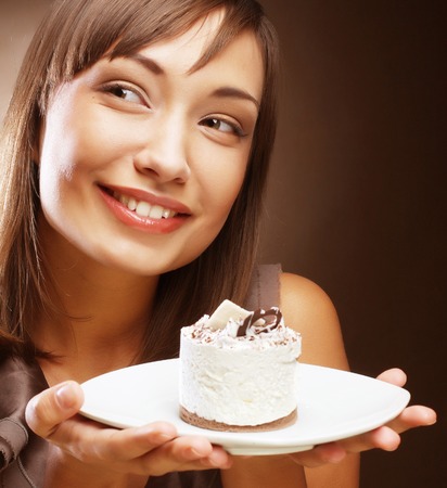 young woman with a cakeの写真素材