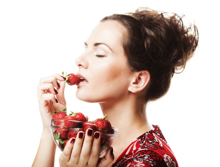happy smiling woman with strawberryの写真素材