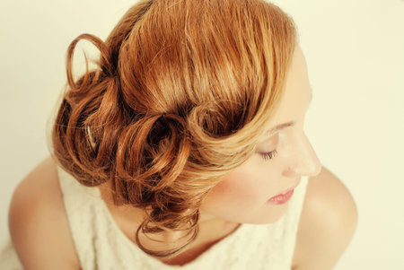 Beautiful blond woman with curly hairstyle