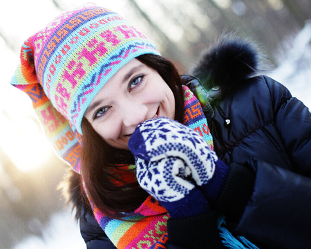 young woman in winter parkの写真素材